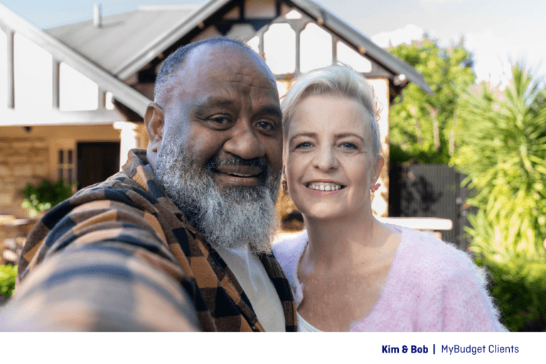 MyBudget clients Kim and Bob smiling together after achieving greater financial confidence.